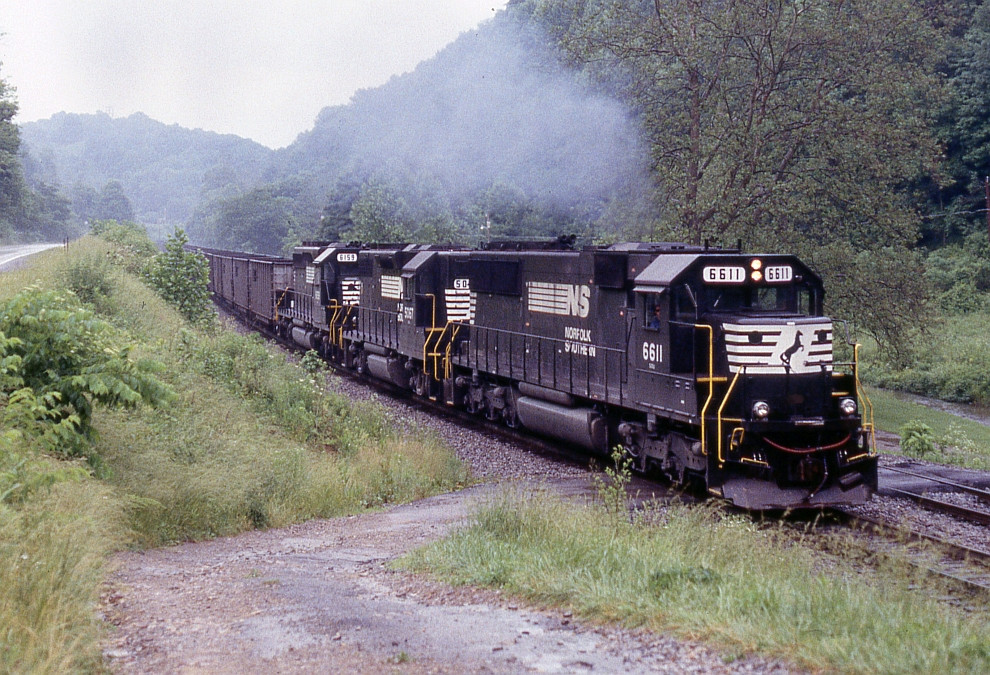 Classic power pulling an empty coal train